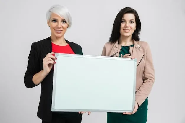 Two professional women in their late 20s are depicted in a panel from a josei manga. They are sitting at a table in a modern office, discussing a project with serious expressions. The art style is detailed and realistic, highlighting their facial expressions and professional attire.